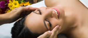 woman receiving a facial